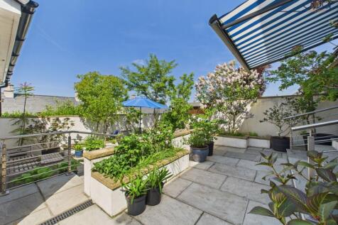 Sliding Patio Doors, Flagged Patio and Seating area