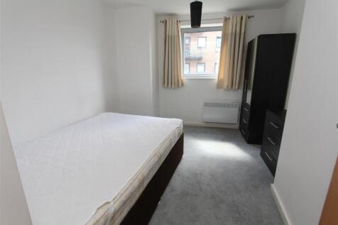 Bright double bedroom with ample storage space...