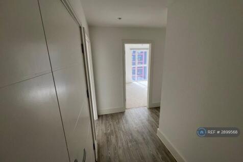 Hallway With Utility To The Left 