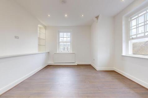 Bright airy living space with modern flooring...