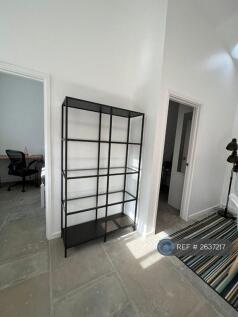 Shelving Unites Outside Two Bedroom Doors