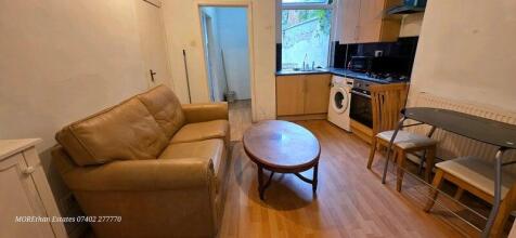 Cosy lounge with comfy sofa and dining space...