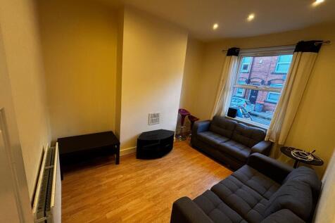 Bright, modern living room with two matching so...