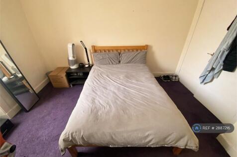 Bright Furnished Bedroom With Storage Drawers