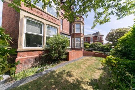 Front elevation &amp; communal gardens