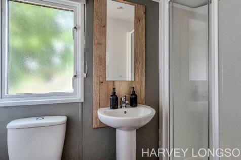 Shower room with toilet, basin and enclosed shower