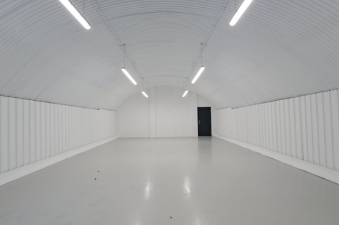 An empty arch with white lining