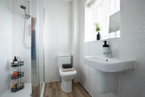 The master bedroom includes an en suite, a private sanctuary for a refreshing start or a relaxing e