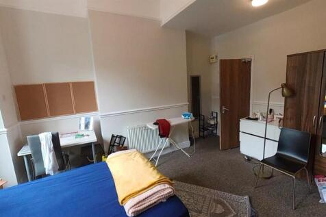 Spacious bedroom with dedicated study workspace...