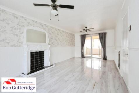 THROUGH LOUNGE / DINING ROOM