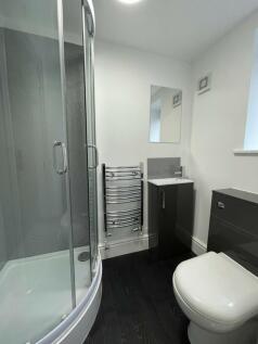 A modern and well-maintained bathroom featuring...