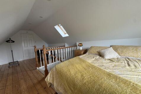 BEDROOM 3 ABOVE THE DOUBLE GARAGE