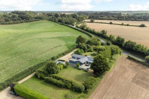 Peaceful rural retreat surrounded by open fields