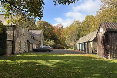 Front of house and outbuildings