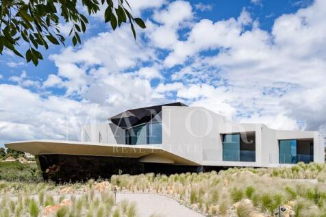Luxury sea view villa in Carvoeiro Algarve surrounded by landscaped gardens