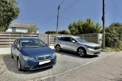 Front parking area for 3 vehicles