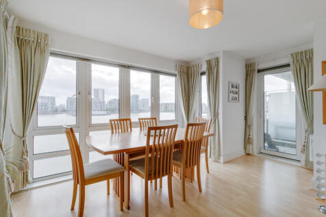Dining Space with River View and Balcony