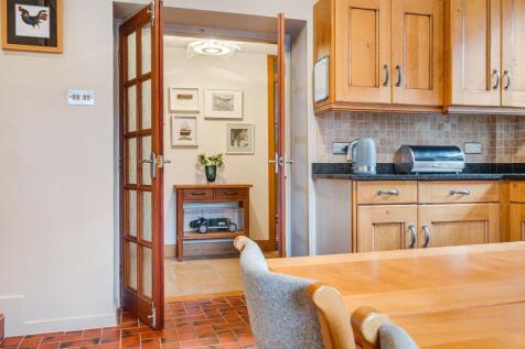 Kitchen - double doors leading back into the hallw