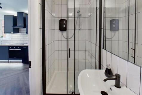 Modern stylish bathroom with crisp white tiles...