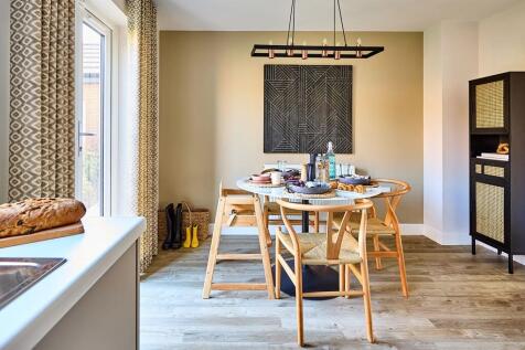 Discover a family dining area flooded with light