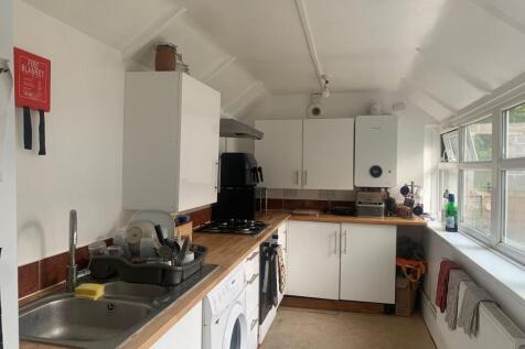 Bright kitchen with ample counter space and lig...