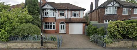 Grand detached home with spacious paved drivewa...