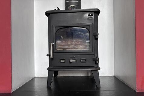 26 latimer road log burner.jpeg