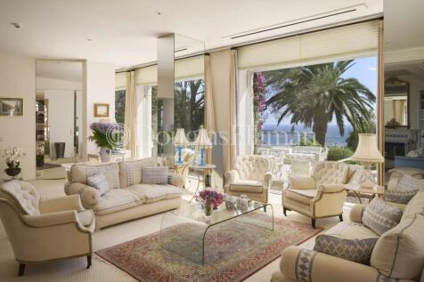 Elegant living room with classic furnishings, larg
