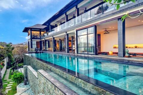 Luxurious modern villa with a long infinity pool, 