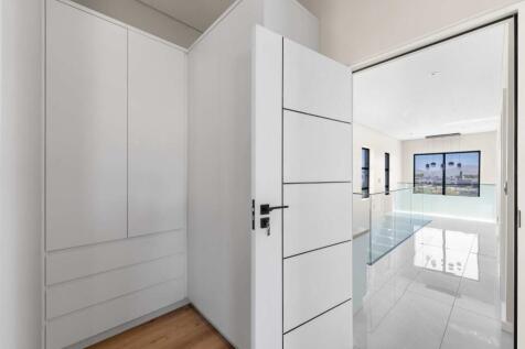 Main ensuite bedroom with built in cupboards