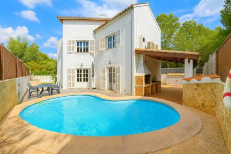 Rear view of house with pool