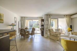 Bright open-plan living and dining area in contemp