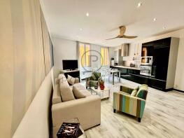 Modern and stylish living room with an open-plan k