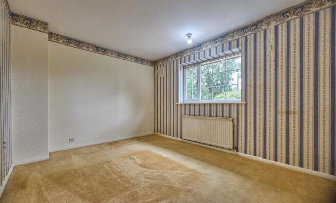 FRONT BEDROOM ONE