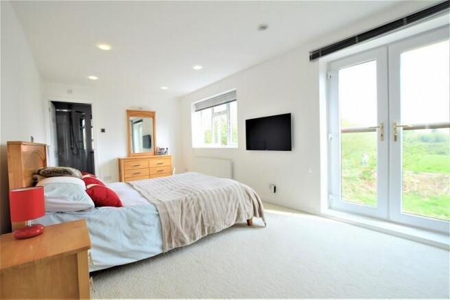 Master bedroom with en-suite and dressing area