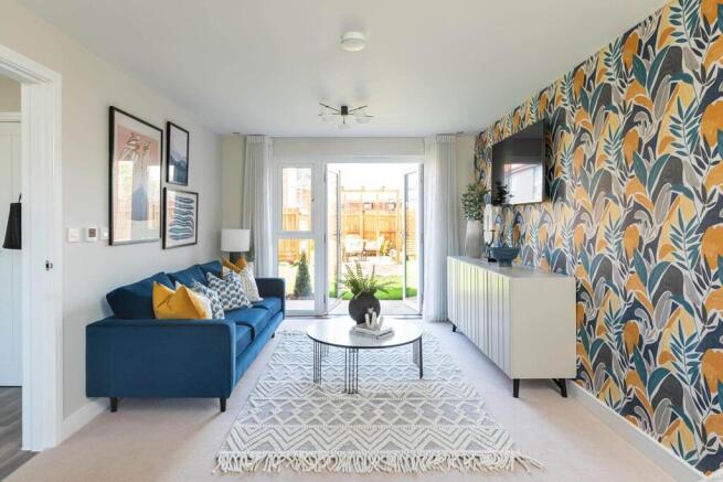 Double doors to the garden create a bright and inviting lounge