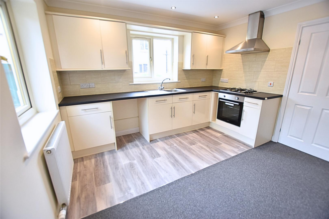 LIVING ROOM WITH OPEN PLAN KITCHEN AREA