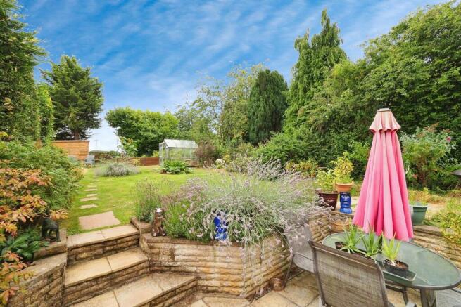 Very well loved and well maintained rear garden with breathtaking views to the rear.