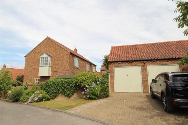 DOUBLE GARAGE & DRIVEWAY