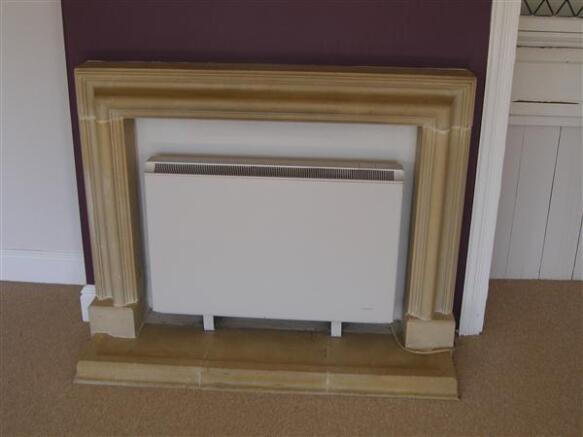 Feature Minster style fireplace and hearth