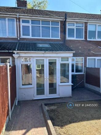 Back Garden With Conservatory