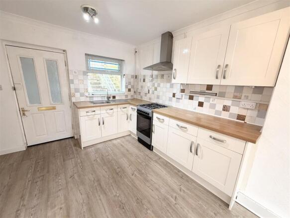 Bright modern kitchen with ample storage space...