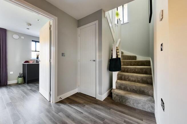 A welcoming entrance hallway awaits