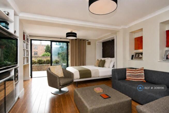 Living Room With King-Size Bed Lowered