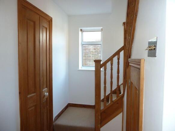 hall to stairs door to cloakroom