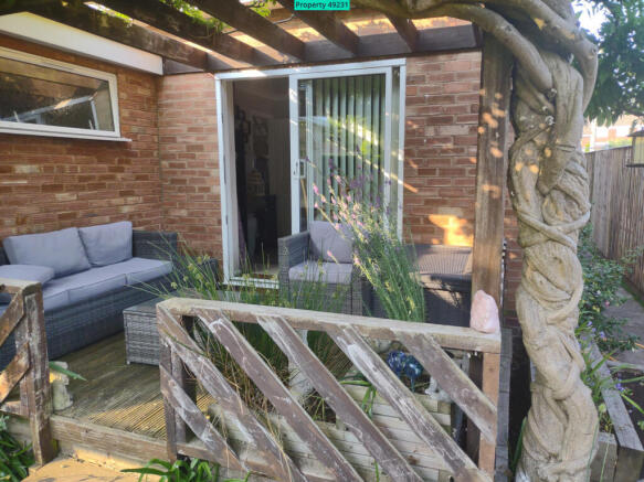 Decking covered by wisteria 
