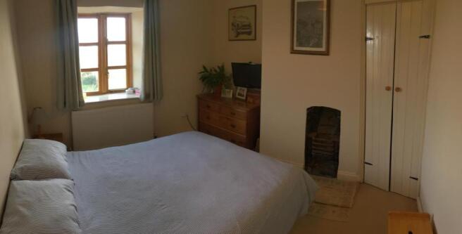 Bedroom One: 10'9" x