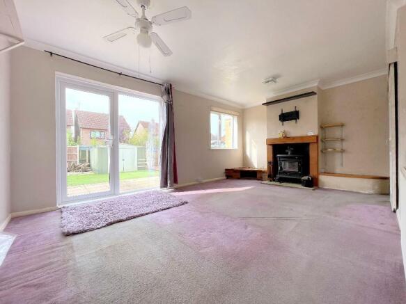Sitting room with wood burner