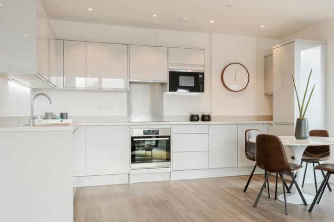 Stylish kitchen with ample storage - typical Taylor Wimpey home