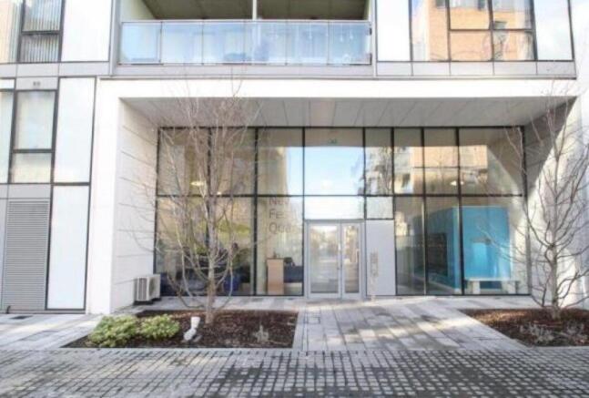Modern bright glass entrance with sleek design...